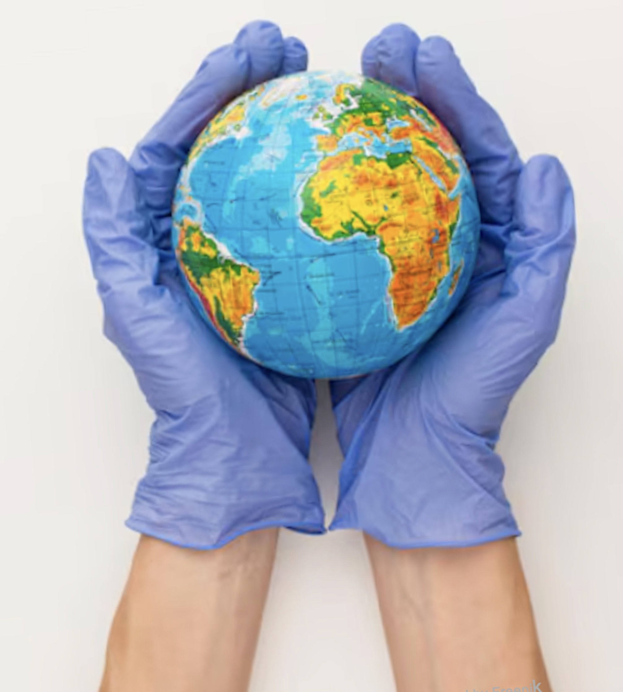 Gloved hands holding a globe