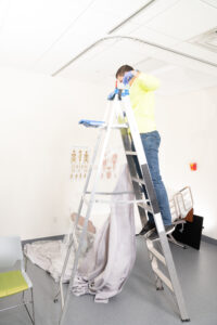Traditional ladder used for curtain change